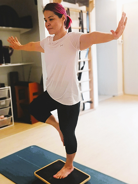 Bold Academy Co Founder Kristie Chen practising pilates